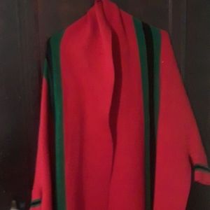 Pretty red shawl with green trim .  Never worn.